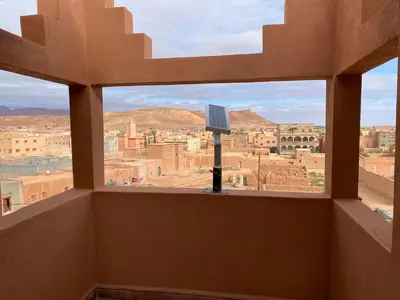 a view of a city from a window at Maison d'hôte IGRANE in Tinerhir