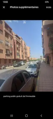 a picture of a car parked on a city street at Apparemment en résidence à 10 mns de Gueliz in Oulad Akkou