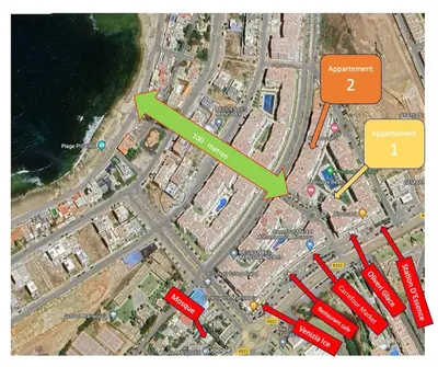 a map of a city with a green arrow at Mansbay Beach in Oulad Akkou