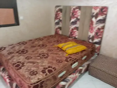a suitcase with a banana sitting on top of it at Chokri lamia in Ouled Khellouf