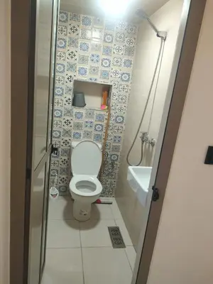 a small bathroom with a toilet and a sink at Dar essaouira in Oulad Akkou