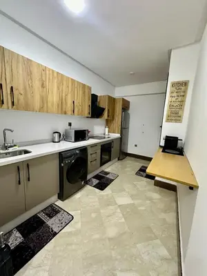 a kitchen with a sink and a dishwasher at Le Scandinave de Marrakech-Gueliz-Centre in Oulad Akkou