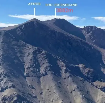 an aerial view of a mountain with a cross on top at Gîte Ayour Atlas Tachddirt in Tacheddirt