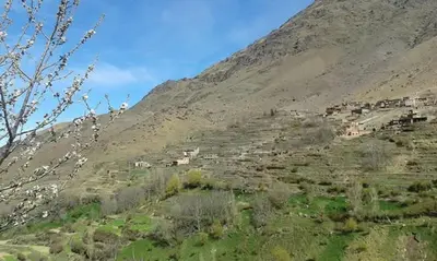 a hill with a village on the side of a mountain at Gîte Ayour Atlas Tachddirt in Tacheddirt