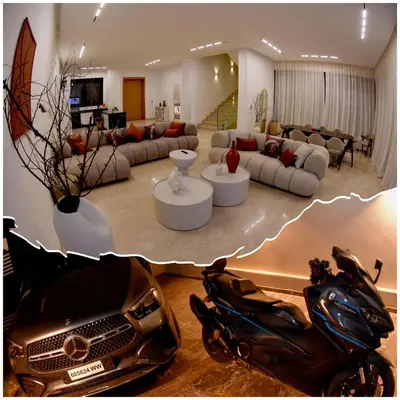 a living room with a motorcycle parked in a living room at Villa À Kenza marrakech in Oulad Akkou