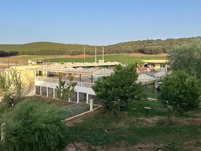 an aerial view of a large building with trees at la maison d'autre Nadia in Sefrou