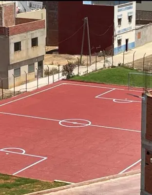 a basketball court with a net on it at Complexe OCEAN ATLANITIQUE in Oulad Akkou