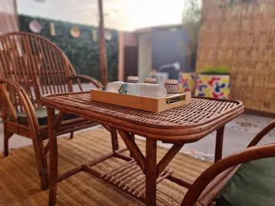 a wooden table with a box on top of it at House Silya in Oulad Akkou