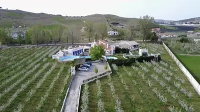 an aerial view of a house with a yard at Le Gîte Dayet Aoua