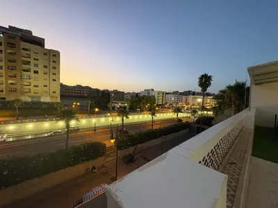 a view of a city street at night with lights at New Design in Today's Style in Oulad Akkou