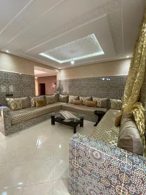 a large living room with couches and a ceiling at villa cherif in Azib Oulad Lâdem
