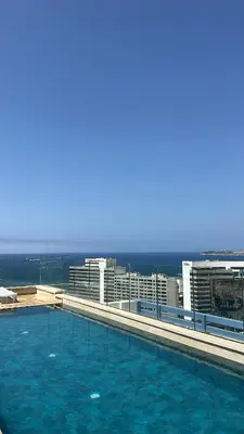 a large swimming pool on top of a building at New luxury appartement in Oulad Akkou