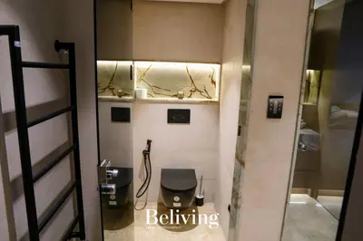 a bathroom with a sink and a toilet in a room at Luxury, private pool and sea view in Oulad Akkou