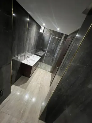 a bathroom with a sink and a shower at Taghazout Bay Villa AMDA in Oulad Akkou