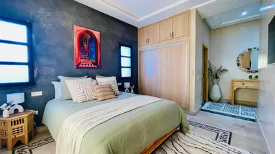 a bedroom with a large bed in a room at Villa Marwa 3ch private Marrakech in Marrakech