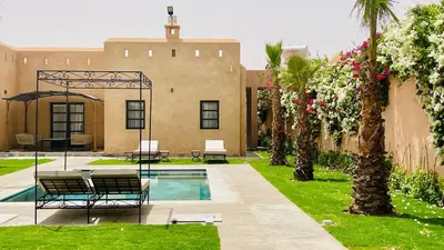 a house with a swimming pool in a yard at Villa Marwa 3ch private Marrakech in Marrakech