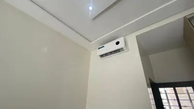 a room with a ceiling with a speaker on a wall at Near University Balcony in Fès