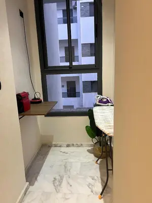 a room with a window and a marble floor at Very nice modern air-conditioned apartment in Fez in Fès