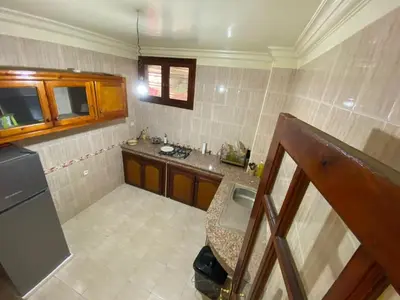 a kitchen with a sink and a counter top at Appartement de Luxe Fes Centre Ville in Fès