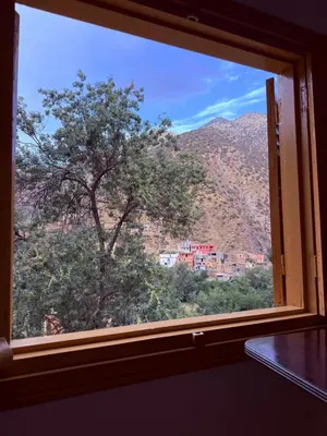 a window with a view of a mountain at 3A Retreat Lodge in Ourika