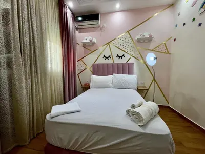 a small bedroom with a bed with a geometric headboard at Luxury Apartment Fes - Premium Area in Fès