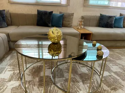 a living room with a couch and a glass table at Luxury Apartment Fes - Premium Area in Fès
