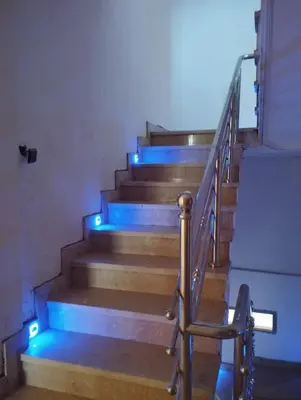 a set of stairs with blue lights on them at Dreamy Stay in Ourika NOVA Pool Villa with Atlas Backdrop in Aguelmous