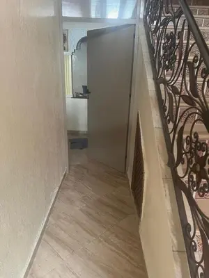a stairway with a door in a building at Appartement à louer 67 m à Safi in Oulad Akkou
