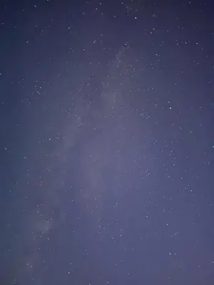 a night sky filled with lots of stars at Arawan Luxury Desert Camp at Erg Lihoudi in Mhamid