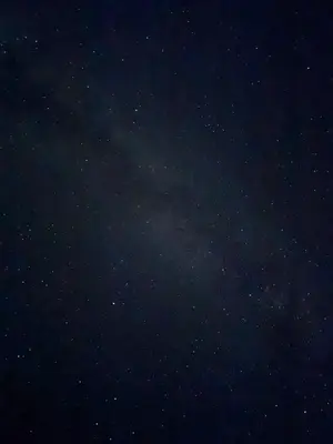 a night sky filled with lots of stars at Arawan Luxury Desert Camp at Erg Lihoudi in Mhamid