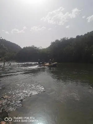 a group of people in a boat on a river at Appart à merjane in Meknès
