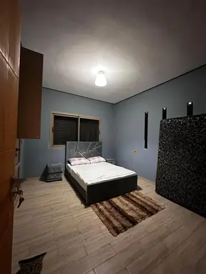 a bedroom with a bed in a room at Villa avec piscine in Meknès