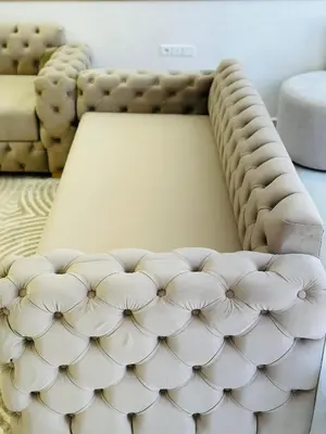 a white couch sitting in a living room at dar diyafa in Beni Mellal