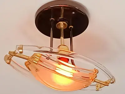 a light hanging from a ceiling at Résidence Al Qaraouiyine in Fès