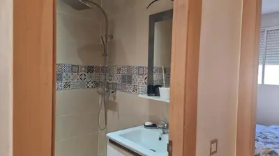 a bathroom with a shower and a sink at Appartement luxueux in Ifrane