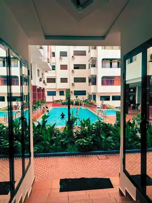 a view of a swimming pool in a building at Apartment in Ouedlaou in Oulad Akkou