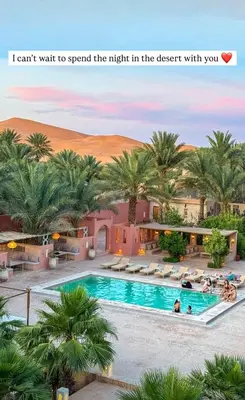 a picture of a pool at a hotel in the desert at Riad Serai Merzouga in Merzouga