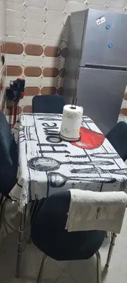 a black and white table with a cake on it at Vip charme in Fès