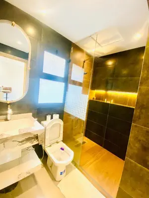 a bathroom with a toilet and a shower at nouvelle studio climatisé in Fès
