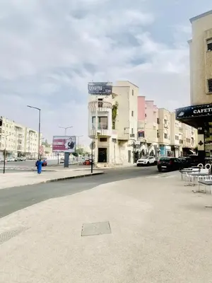 an empty street in a city with buildings at nouvelle studio climatisé in Fès