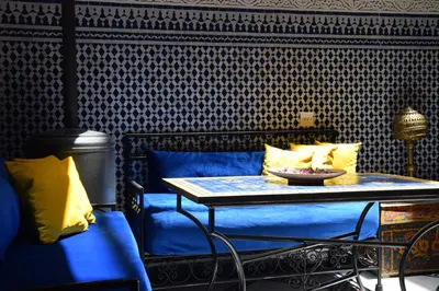 a table with a bowl on it in a room at Dar Omar in Fès