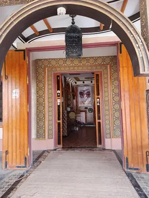 an entrance to a building with an archway at Africa Hollywood in Aït Ben Haddou
