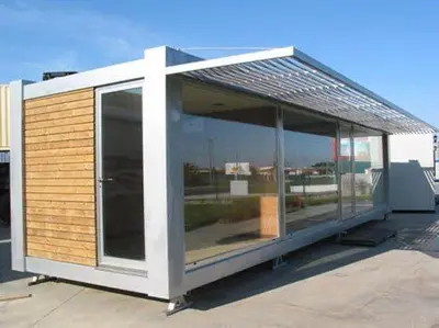a small building with glass doors on a roof at الريصاني in Er Rachidia