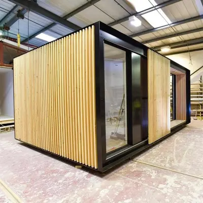a building with wooden panels on the side of it at الريصاني in Er Rachidia