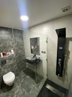 a bathroom with a toilet and a sink at You'll be comfortable there! in Fès
