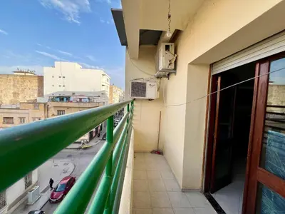 a balcony of a building with a view of a street at Fes City Luxury Suites - Apartments & Studio in Fès
