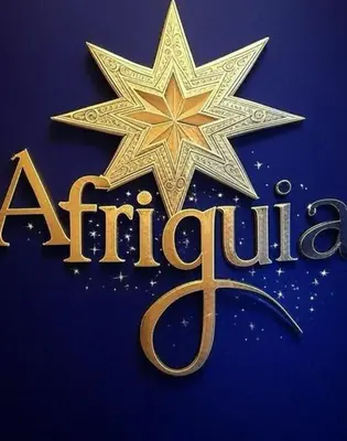 a starbucks sign with the word aladdin at Afriquia Star in Oulad Akkou