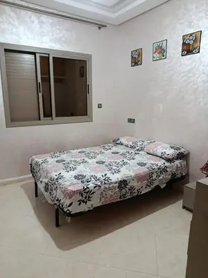 a bedroom with a bed in a room at Dar araha in Fès