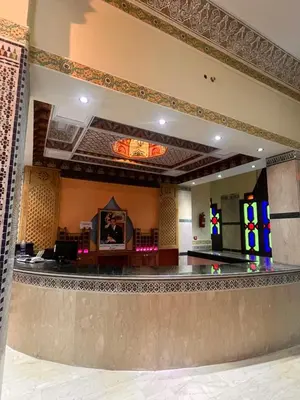 a view of a synagogue lobby with stained glass windows at Hotel Ourida Zagora in Zagora