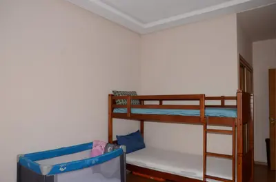 a room with two bunk beds in a room at Apartment with large terrace and pool in Fès